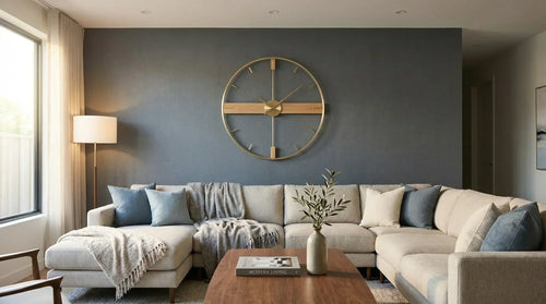 Stylish oversized wall clock as focal point above modern sofa in well-decorated living room
