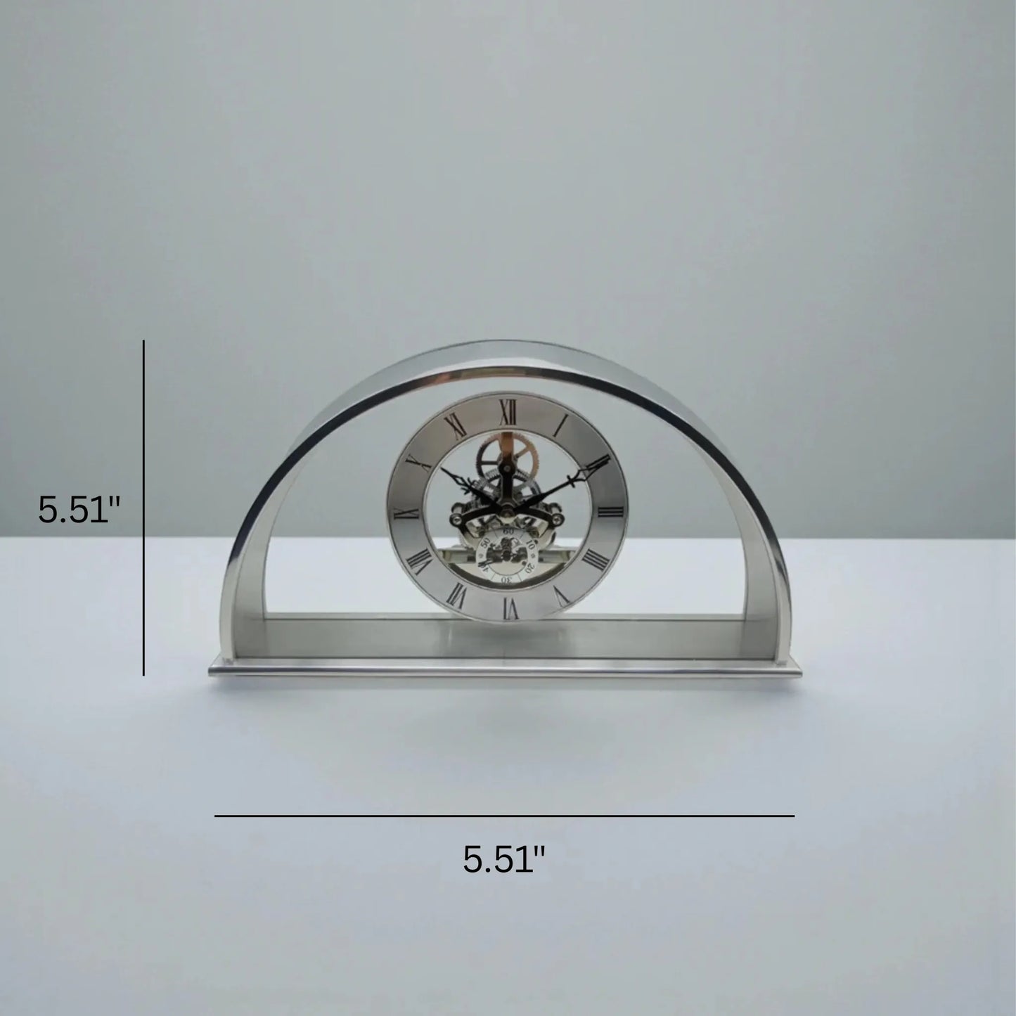 Crystal table clock - Cranley, an elegant arch-shaped piece displaying intricate chrome gears through a Roman numeral dial, complemented by a rich cherry wood finish, ideal for special occasions.