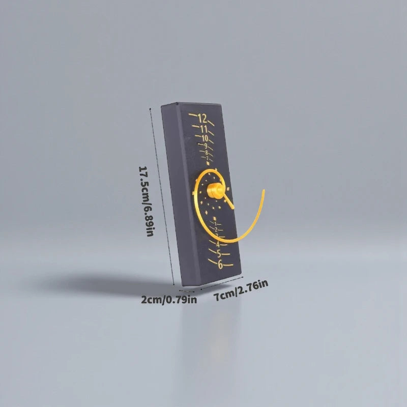 Fibonacci Wall Clock - Morston: A small clock with a dark rectangular block, featuring a yellow pivoting arm and scale, embodying the elegance of mathematical precision and minimalist design.