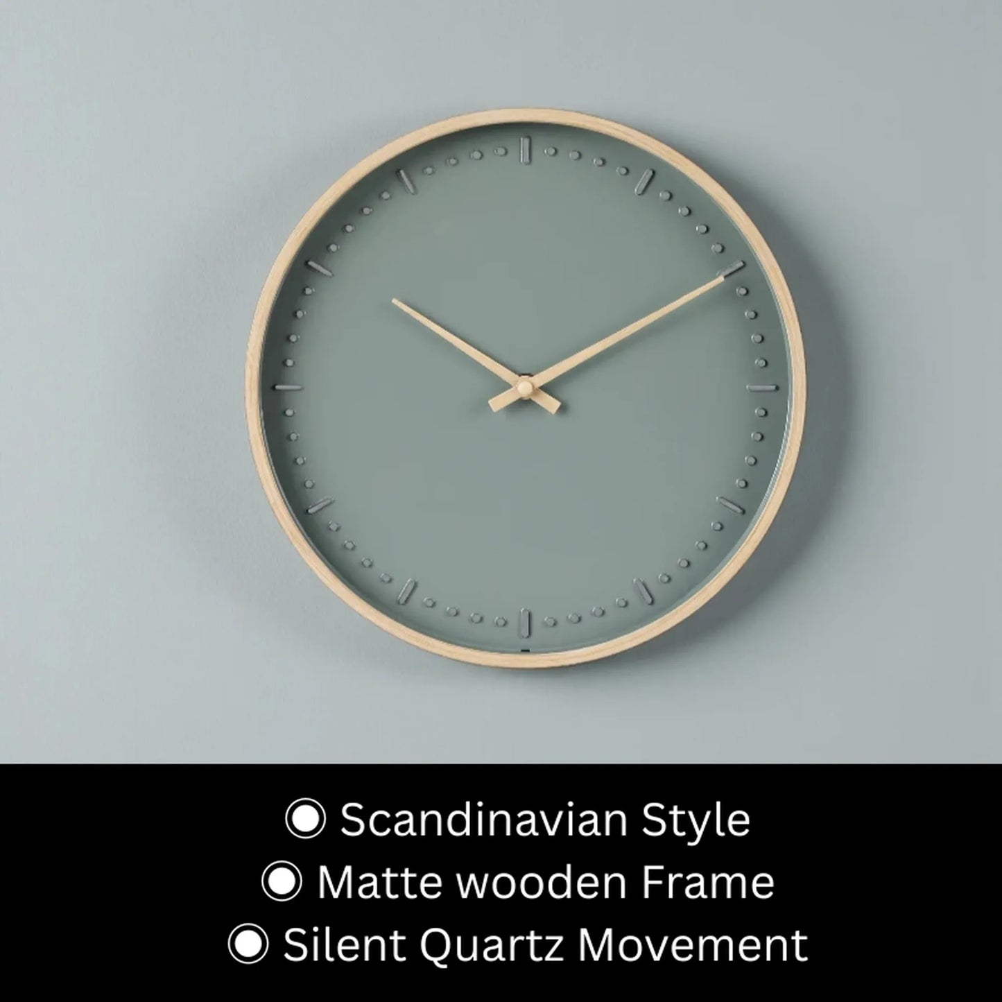 Small modern wall clock - Merrin: A minimalist Scandinavian-style design featuring a sage green face with raised hour dots, slim light-wood frame, and silent quartz movement, creating a serene focal point for any room.
