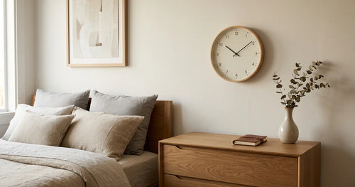 Peaceful bedroom with strategically placed wall clock for optimal sleep