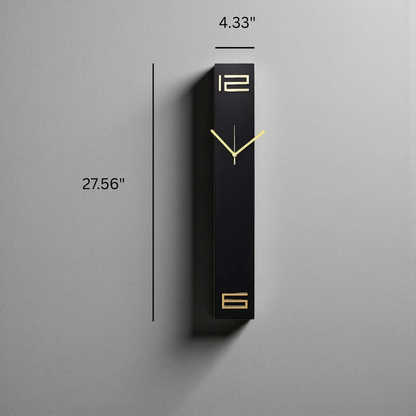 Modern long wall clocks - Rowell: A tall, narrow matte black clock with minimalist gold-tone hands and numerals 12 and 6, perfect for adding a sculptural touch to any space.