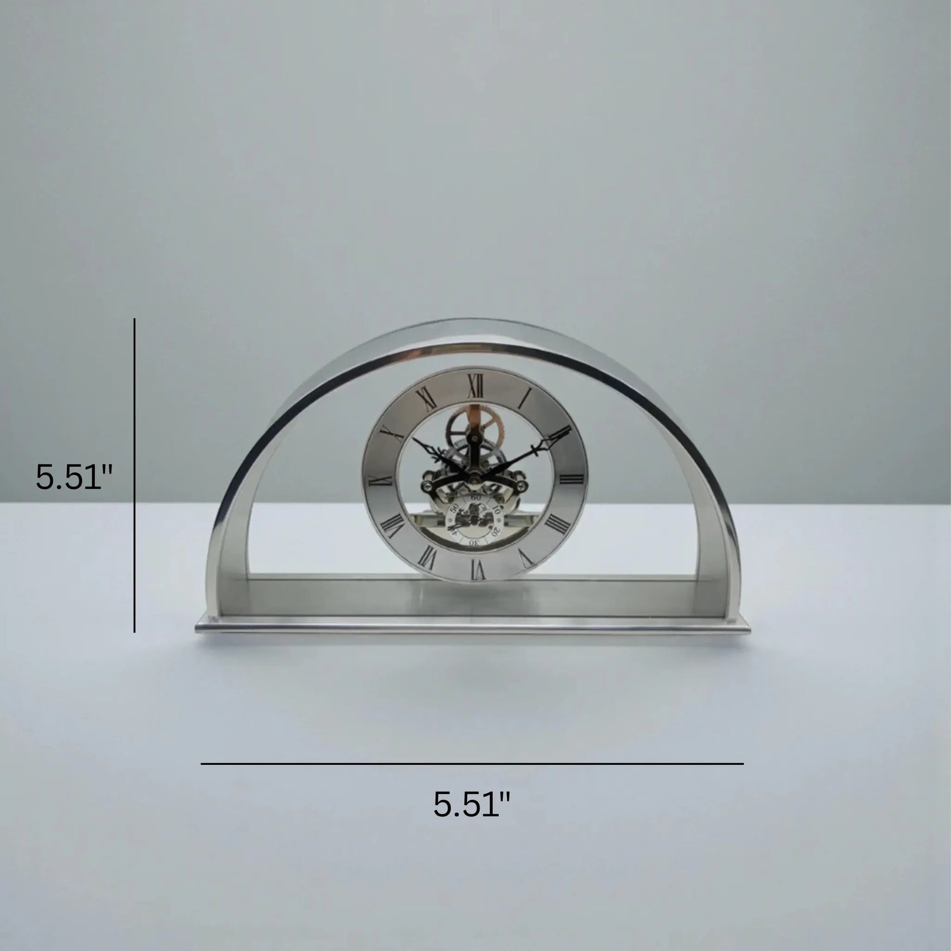 Crystal table clock - Cranley, an elegant arch-shaped piece displaying intricate chrome gears through a Roman numeral dial, complemented by a rich cherry wood finish, ideal for special occasions.
