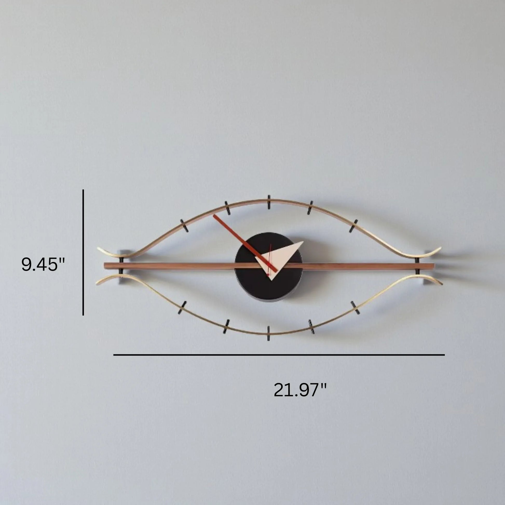 30-inch decorative wall clock - Ashen features an eye-shaped silhouette with brass rods as eyelids, a black clock body, white and red hands, exemplifying industrial style and vintage charm.