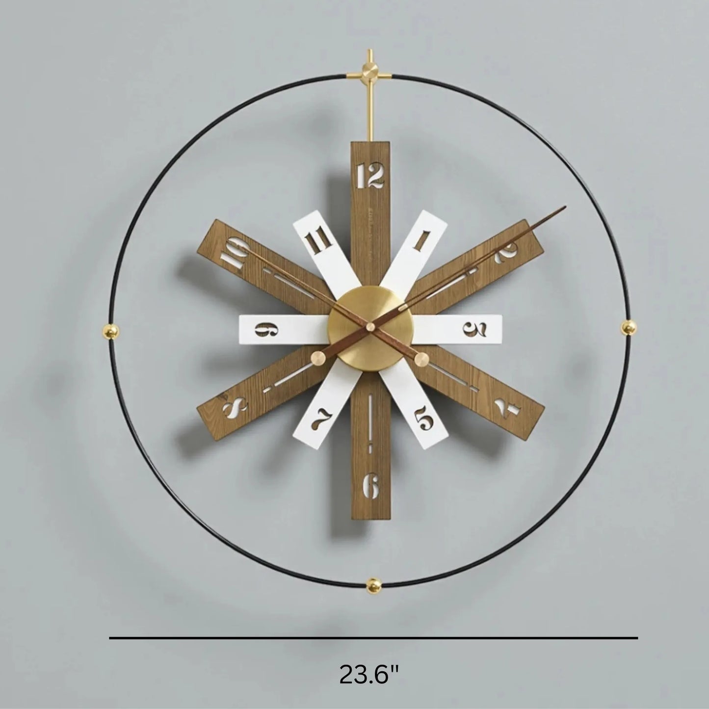 Modern Lounge Wall Clocks - Fremton features a black metal hoop with brass beads, wooden spokes with cut-out numerals, and brass hands, creating a striking architectural timepiece.
