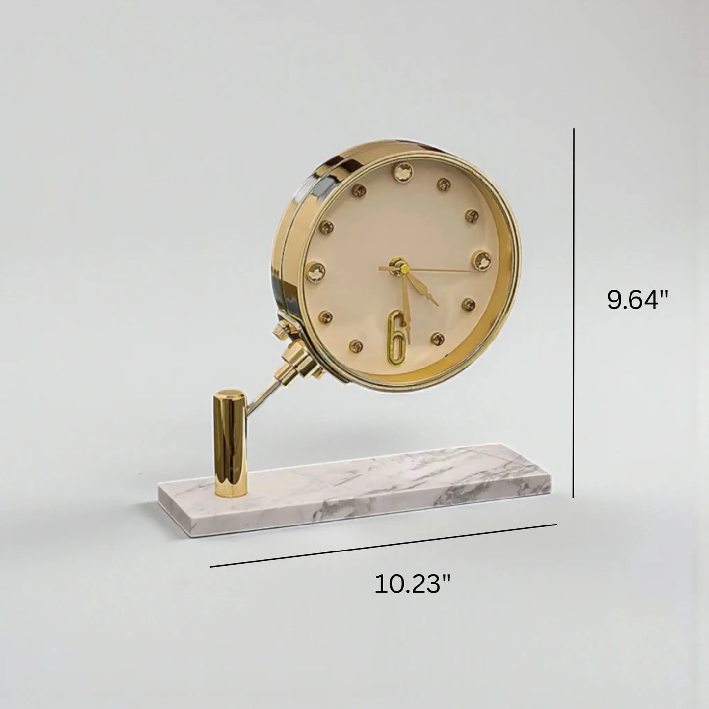 Luxury Table Clock - Corlen: A gold-plated analog desk clock with crystal hour markers and oversized 6, elegantly angled on a white marble base, enhancing modern decor in homes or executive offices.