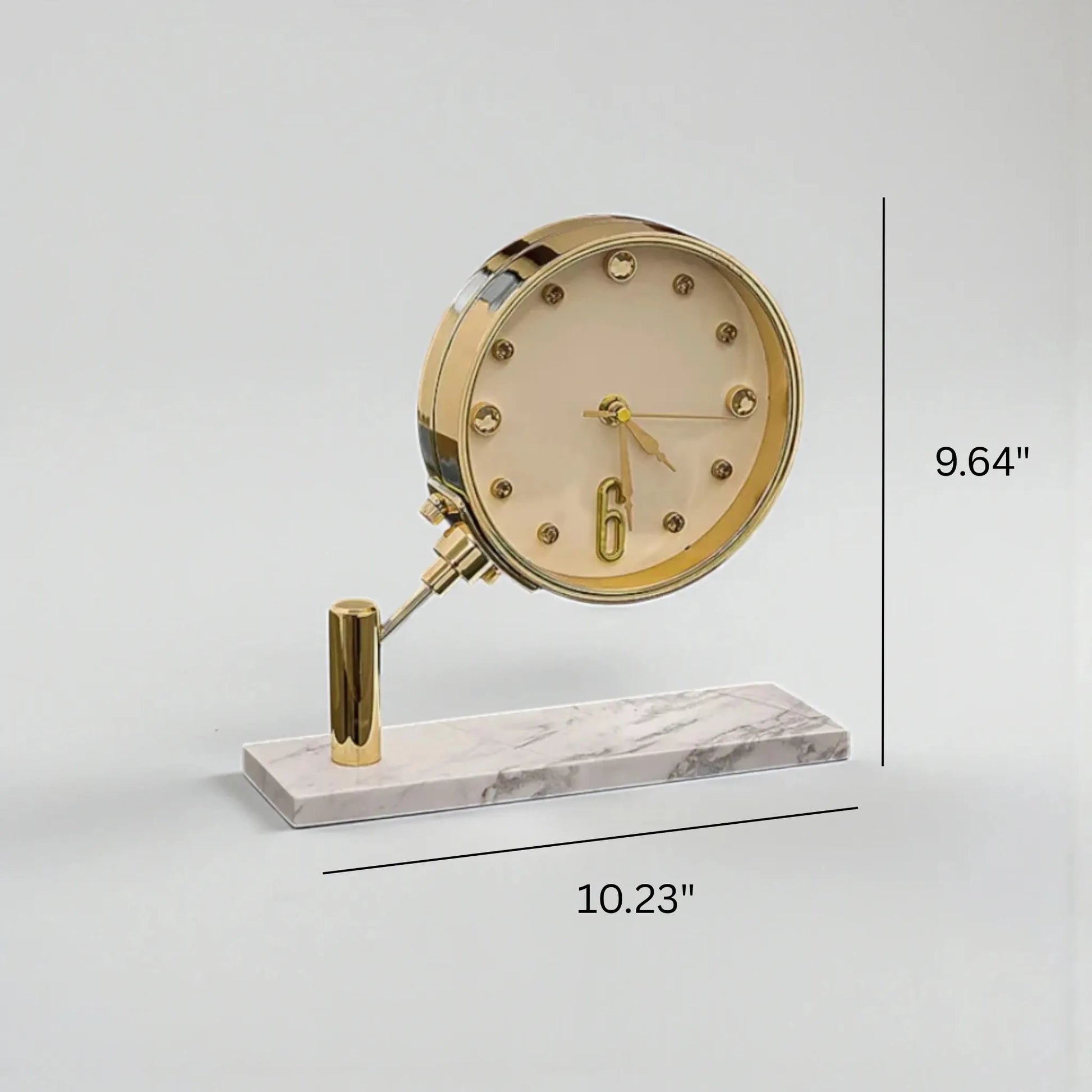 Luxury Table Clock - Corlen: A gold-plated analog desk clock with crystal hour markers and oversized 6, elegantly angled on a white marble base, enhancing modern decor in homes or executive offices.