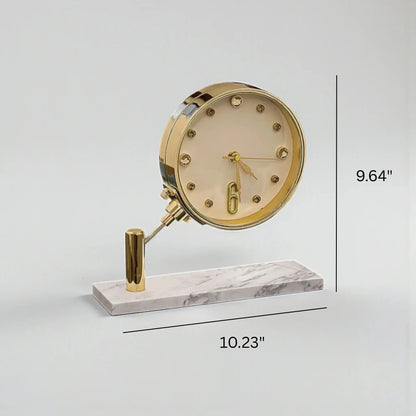 Luxury Table Clock - Corlen: A gold-plated analog desk clock with crystal hour markers and oversized 6, elegantly angled on a white marble base, enhancing modern decor in homes or executive offices.