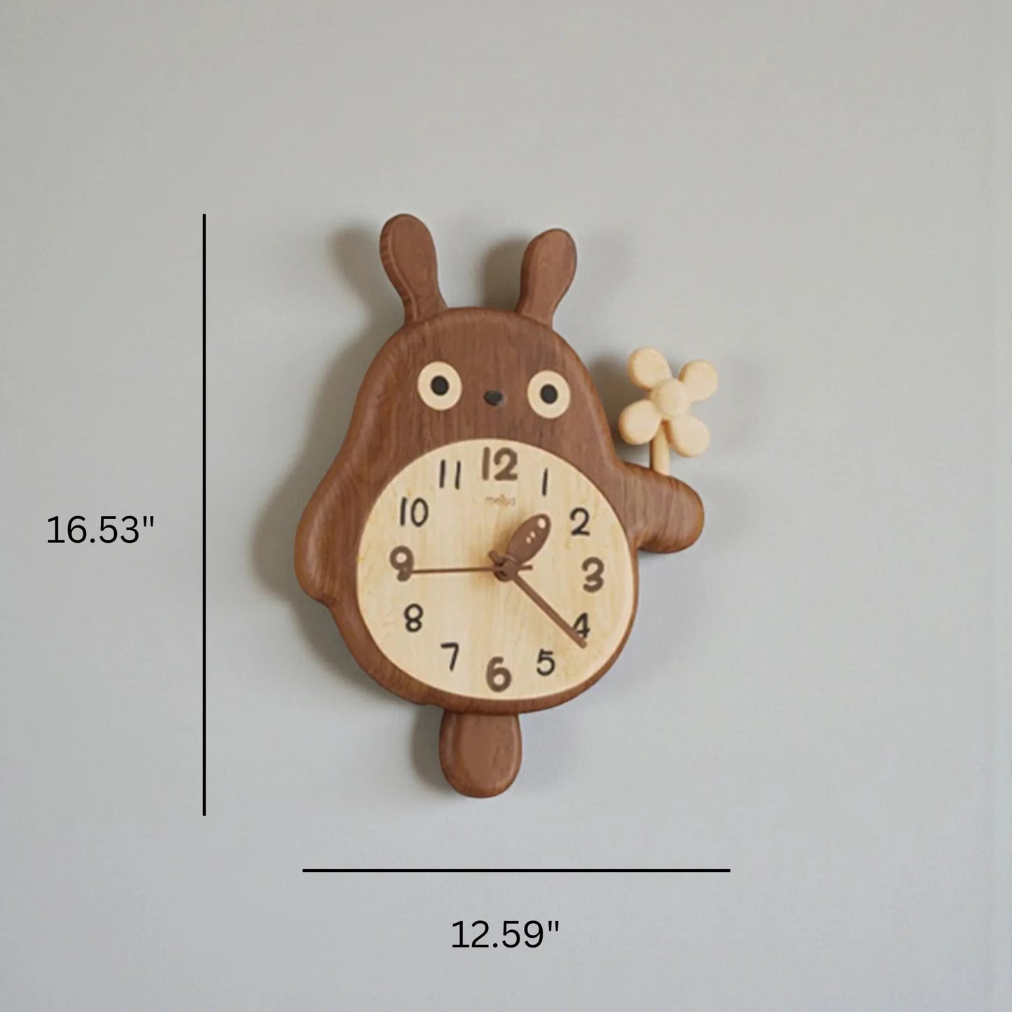 Small decorative wall clocks - Veynor features a cartoon-style rabbit carved from two tones of wood, holding a flower, with dimensions of 16.5 tall by 12.6 wide, adding charm to any space.