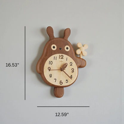 Small decorative wall clocks - Veynor features a cartoon-style rabbit carved from two tones of wood, holding a flower, with dimensions of 16.5 tall by 12.6 wide, adding charm to any space.