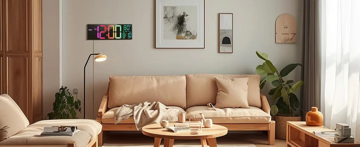 Large digital wall clock - Eldon with jumbo LED numbers displaying time, temperature, and date, mounted on a minimalist living room wall above a beige sofa and wooden coffee table.