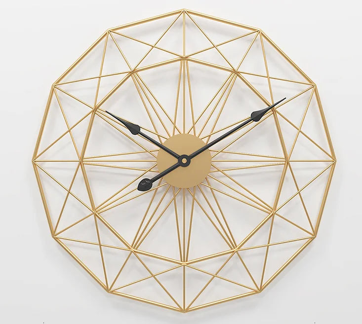Modern Style Wall Clock - Blenford features an open-frame design with a gold-tone metal wireframe and radial spokes, showcasing minimalist elegance with two slim black hands on a central hub.