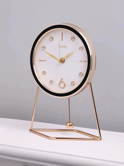 Pendulum Table Clock - Dralen: A modern, elegant tabletop clock with a round face, minimalist gold markers, and a swinging pendulum, perfect for enhancing your mantel or desk with dynamic elegance.