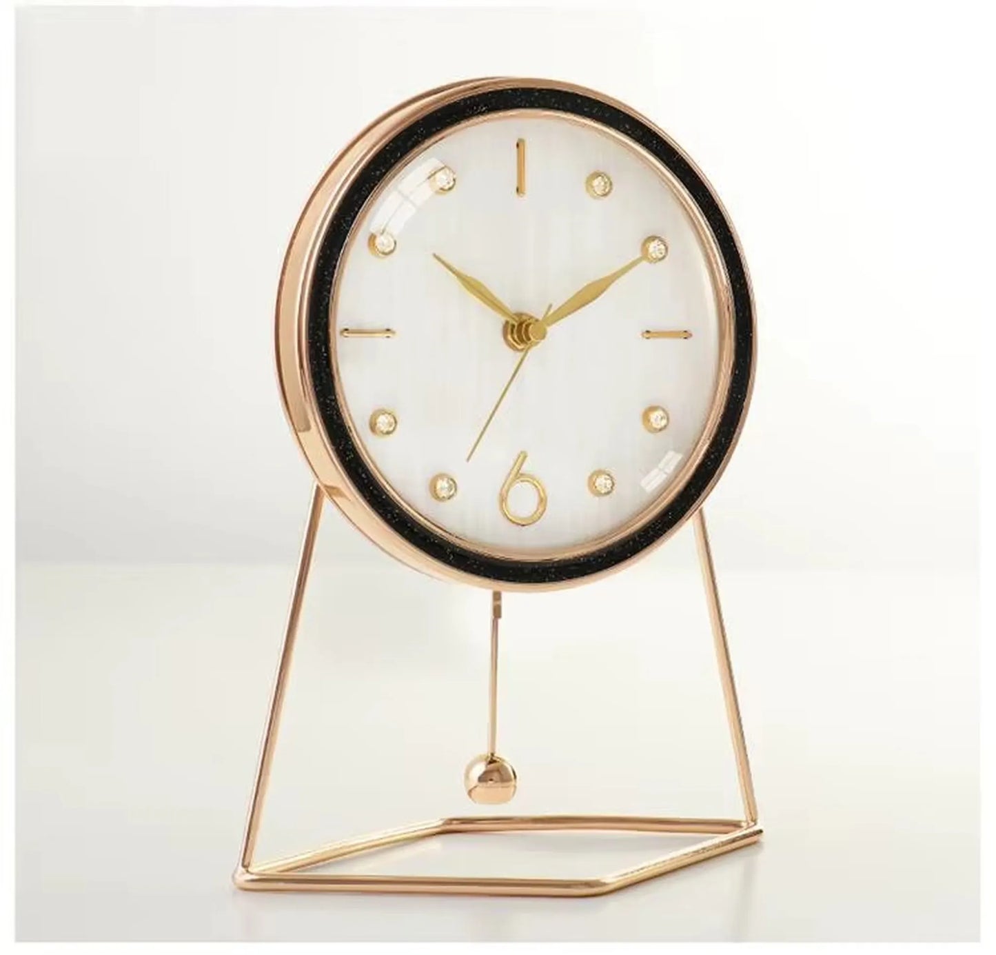 Dralen Pendulum Table Clock: A stylish tabletop clock with a white dial, gold-tone details, and a decorative pendulum. Perfect for adding elegance to any mantel or desk.