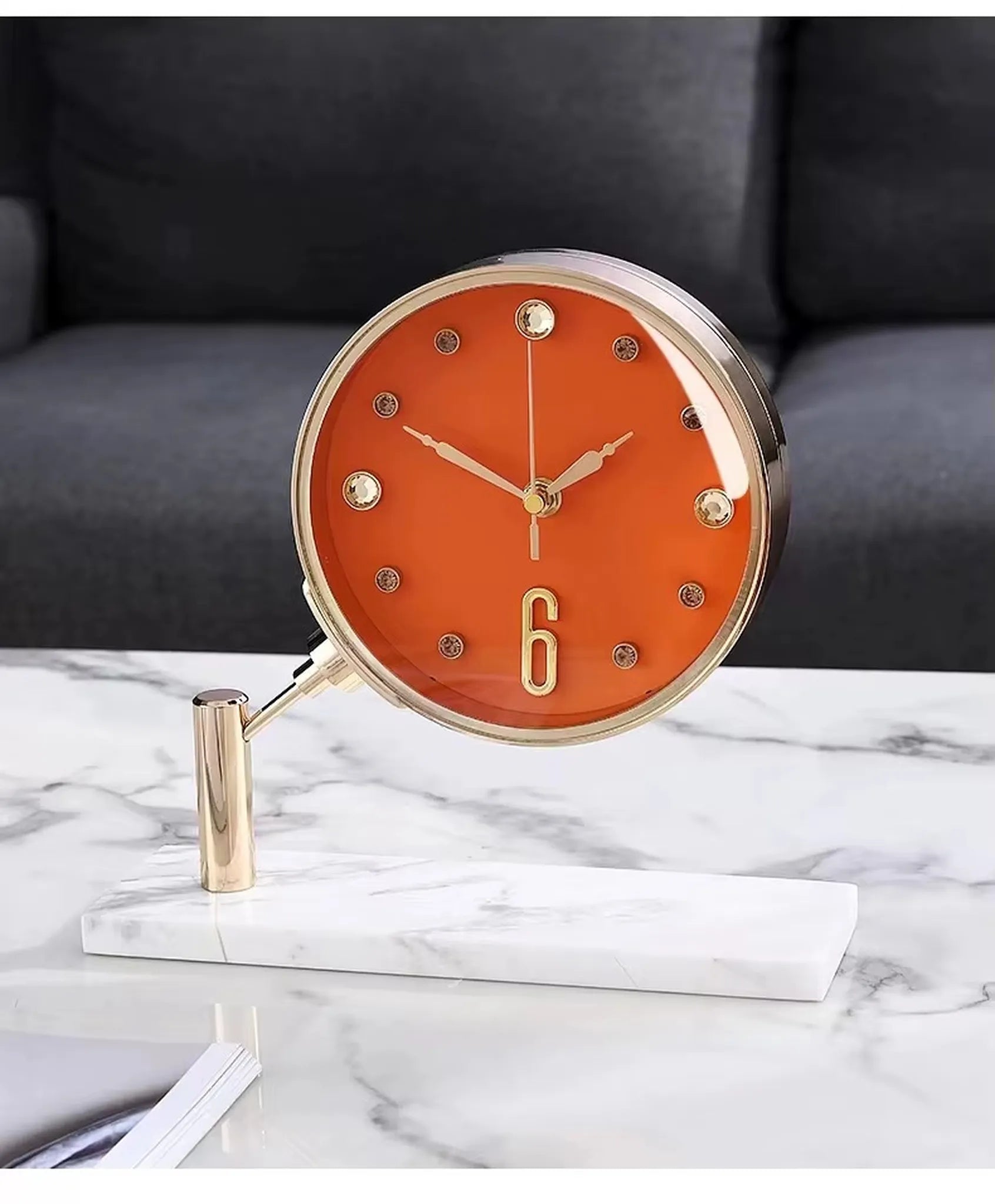 Luxury Table Clock - Corlen: A modern decorative clock with a bright orange dial, gold-tone accents, set on a marble base, ideal for adding elegance to any space.