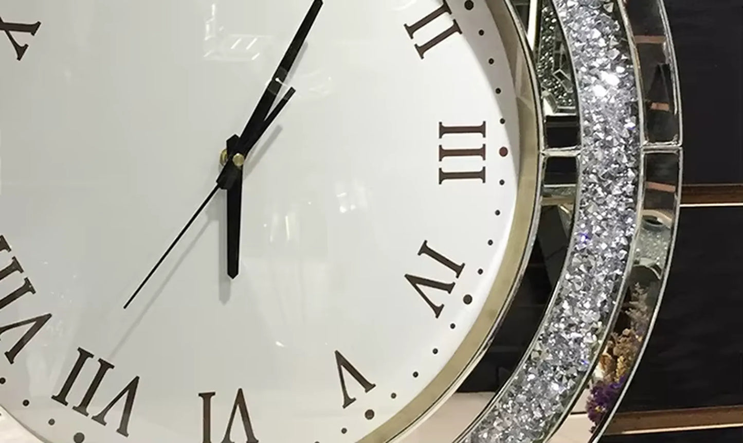 Fancy wall clock - Norwyn: Close-up of a round clock with a white face, dark Roman numerals, and a glittering crystal-like rim, embodying elegance and premium quality.