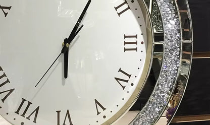 Fancy wall clock - Norwyn: Close-up of a round clock with a white face, dark Roman numerals, and a glittering crystal-like rim, embodying elegance and premium quality.