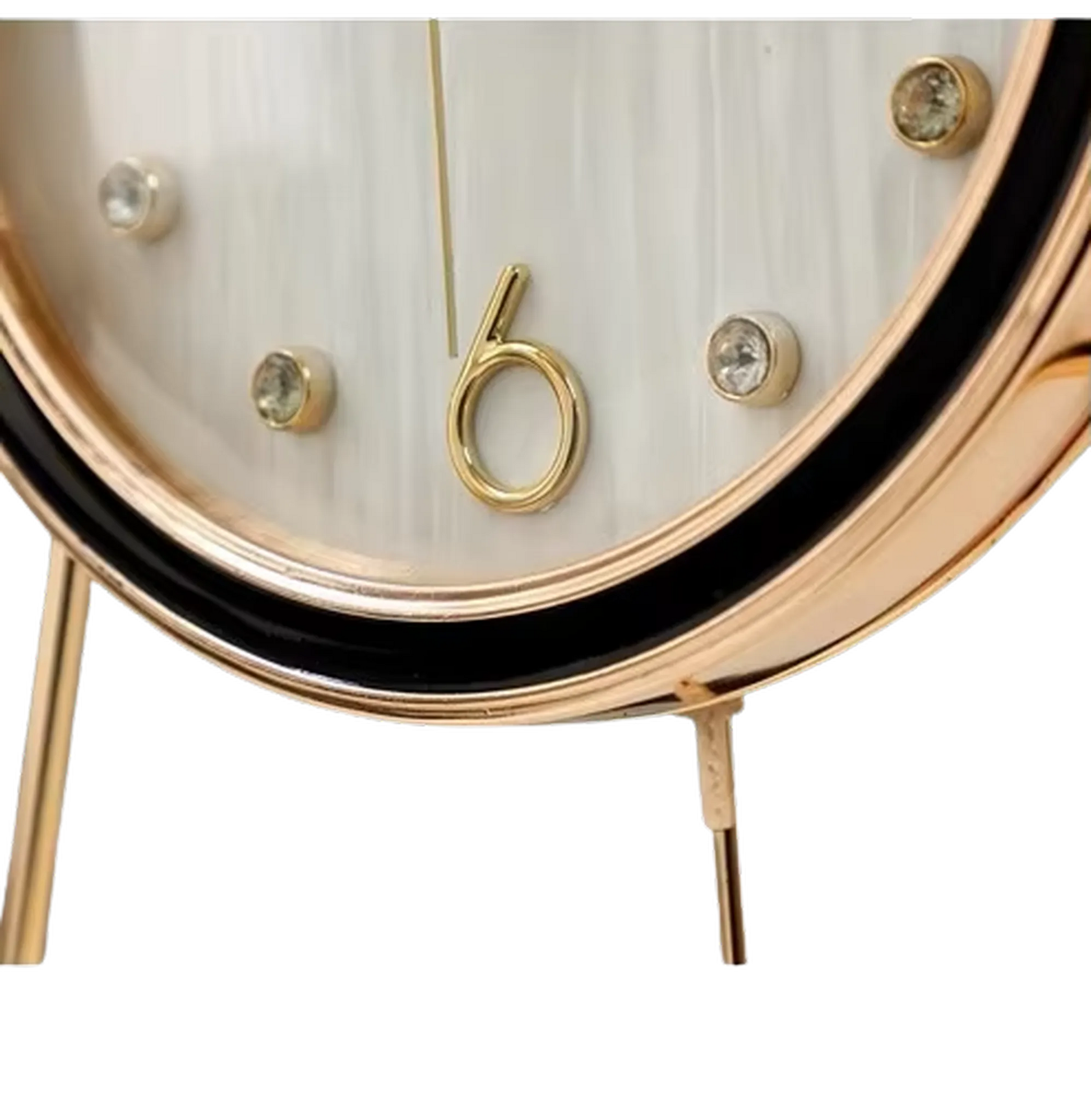 Pendulum Table Clock - Dralen: A close-up of this elegant clock features a gold-tone bezel and legs, white face with crystal markers, and a stylized gold “6” at the bottom.