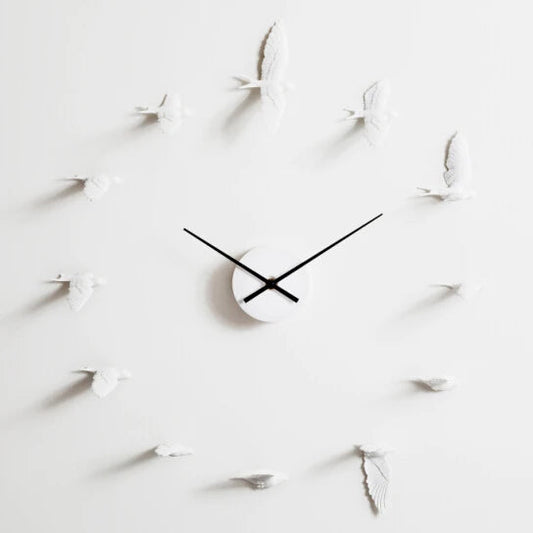 Decorative kitchen wall clocks - Darven: A minimalist design featuring a central clock mechanism with black hands, surrounded by white bird sculptures in place of numerals, ideal for enhancing open kitchen spaces.