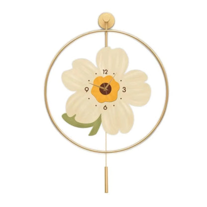 Flower wall clock - Fentin: Elegant wall clock featuring a gold-tone frame with a stylized blossom design. The clock face is integrated within the flower's center, accented by a pendulum for a charming touch.