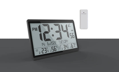 Atomic wall clock - Harven with LCD displaying time, date, indoor and outdoor temperatures, and humidity from an external wireless sensor, ensuring accurate time via atomic syncing.