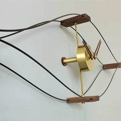 Horizontal eye-shaped clock mounted on white wall in home office