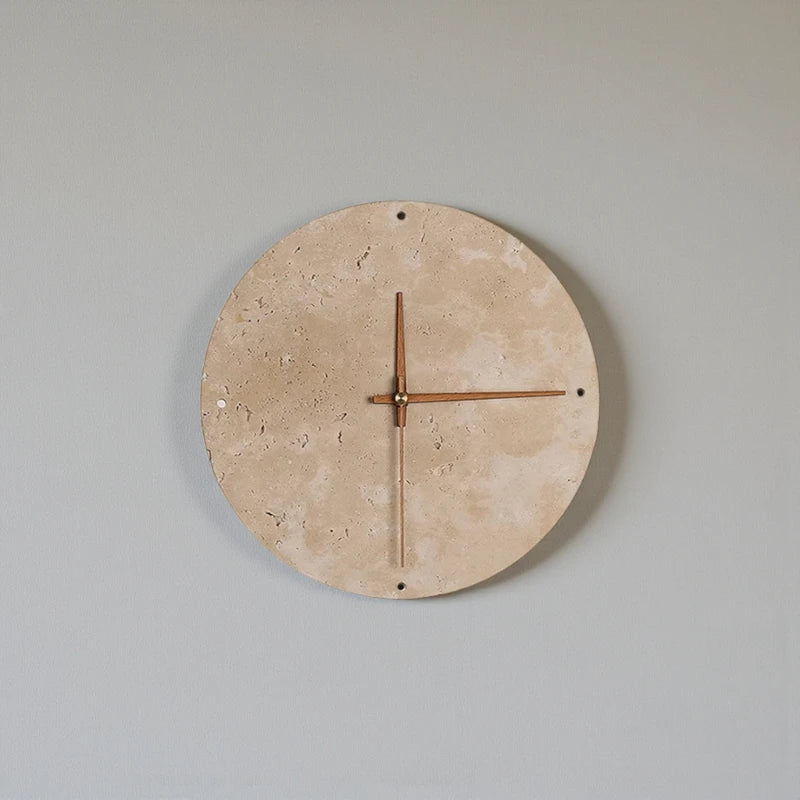 Modern wall clock for living room - Torwyn: A minimalist travertine clock with slender copper hands and LED halo, featuring subtle drilled hour markers, perfect for elevating bathrooms or patios.