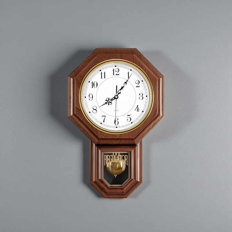 Vintage wall clock pendulum - Heritage: A classic regulator-style clock with an octagonal wooden case, white face with black hands and numerals, and a brass pendulum visible through a glass compartment.
