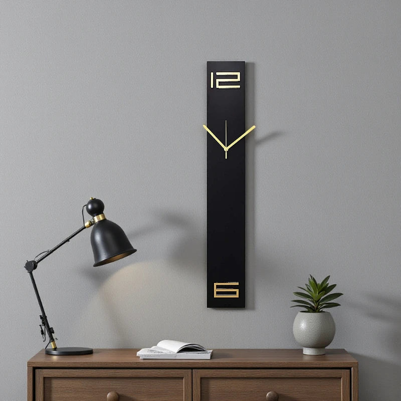 Modern long wall clocks - Rowell: A sleek black clock with gold hands, numerals 12 and 6, hangs above a wooden console, embodying minimalist elegance and whisper-silent timekeeping, perfect for contemporary interiors.