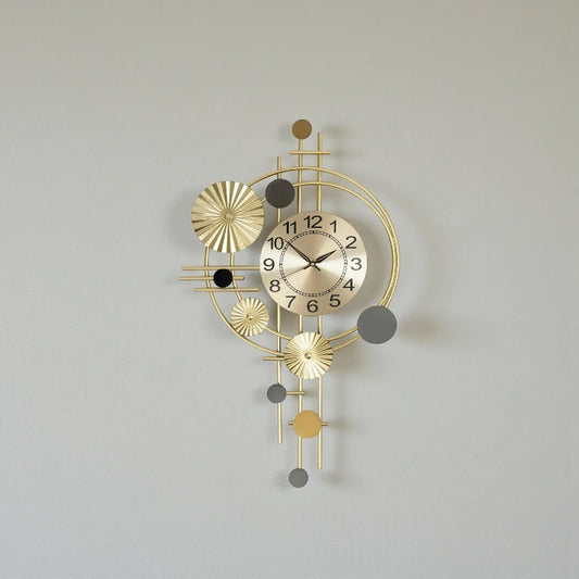 Oversized wall clock modern - Hashford features a gold metallic face with black numerals and brass hands, complemented by geometric metal rings and discs, offering a sculptural, contemporary design.