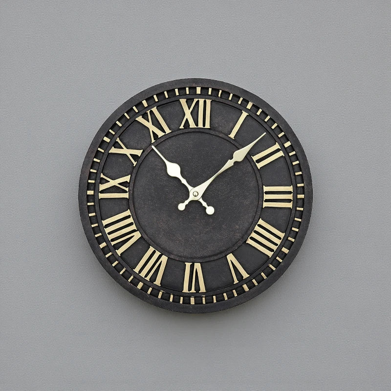 Bronze outdoor wall clock - Geneva, featuring a dark face with gold Roman numerals and hands set to 10:10, combines timeless elegance with durable, all-weather construction for indoor or outdoor use.