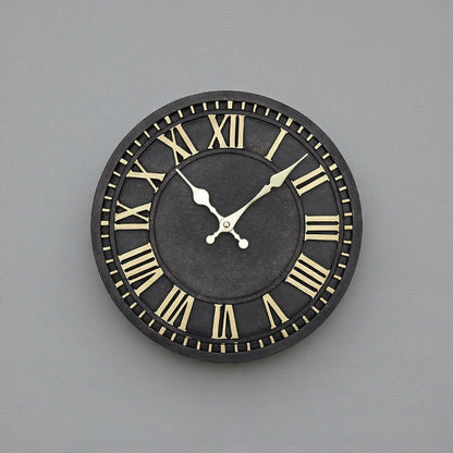 Bronze outdoor wall clock - Geneva, featuring a dark face with gold Roman numerals and hands set to 10:10, combines timeless elegance with durable, all-weather construction for indoor or outdoor use.