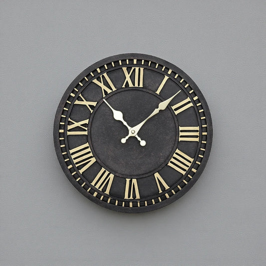 Bronze outdoor wall clock - Geneva, featuring a dark face with gold Roman numerals and hands set to 10:10, combines timeless elegance with durable, all-weather construction for indoor or outdoor use.