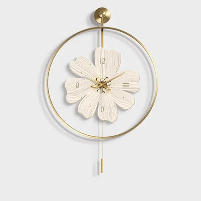 Flower wall clock - Fentin: A decorative wall clock styled as a six-petaled flower with gold hour markers and hands, encased in a circular gold frame with a hanging pendulum rod.