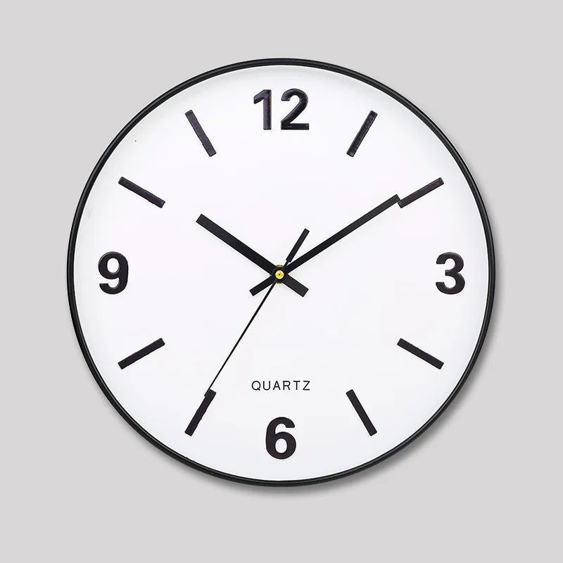 Modern Silent Wall Clock - Densford with a minimalist design featuring a white face, black trim, and non-ticking quartz movement, ideal for adding contemporary elegance to any space.
