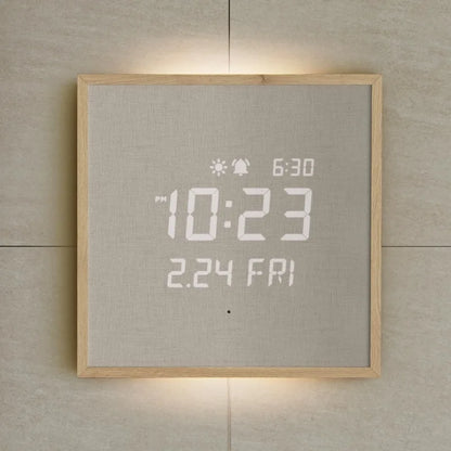 Modern Digital Wall Clock - Belcroft: A minimalist wall-mounted clock with a backlit LED display showing PM 10:23 and 2.24 FRI, framed in light wood, blending art with functionality.