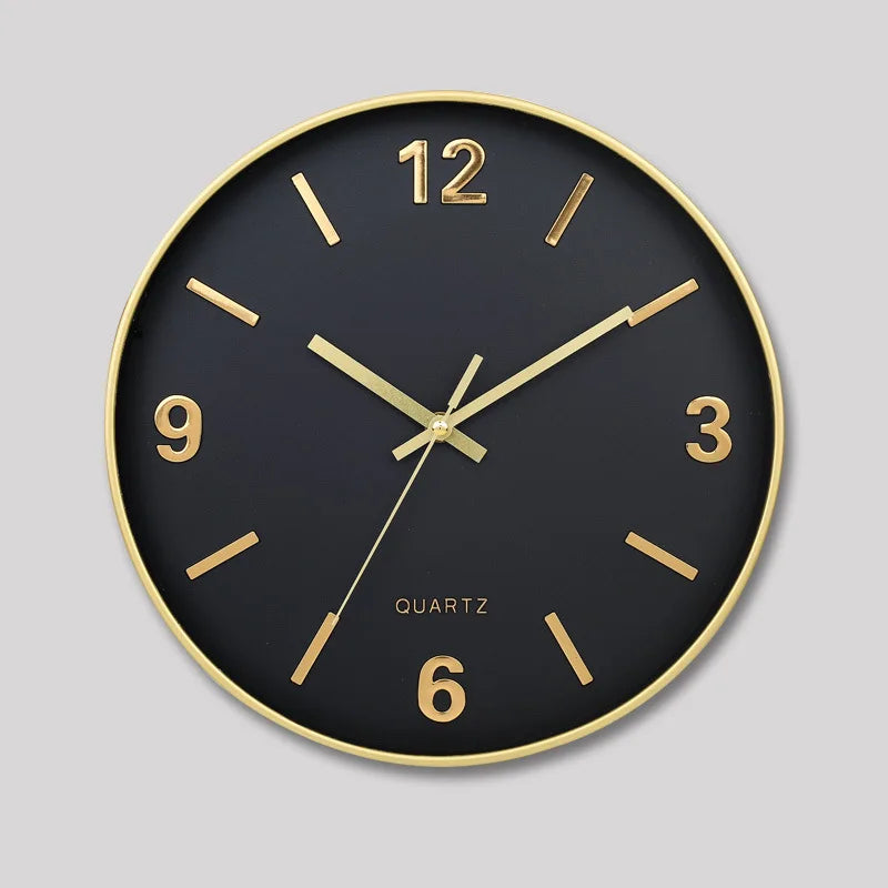 Modern Silent Wall Clock - Densford: A sleek wall clock featuring a matte black face, metallic gold accents, and silent quartz movement, with gold-plated hands and numerals, offering contemporary elegance for any room.