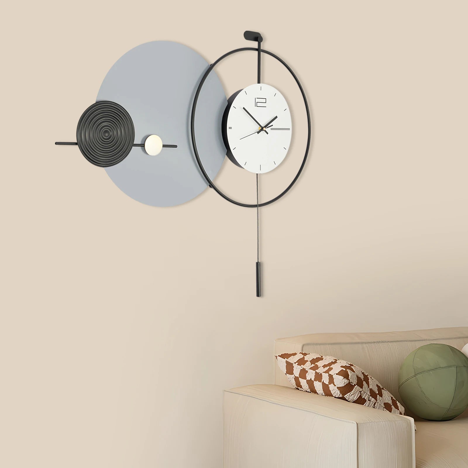 Big Wall Clock Modern - Darrington, featuring a minimalist design with a gray backplate, textured black disc, and sleek metal ring, complements contemporary spaces with its striking, sculptural elegance.