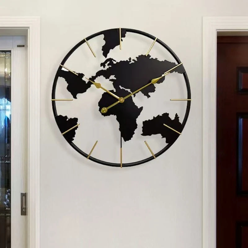 World Map Wall Clock - Claverton features a cut-out world map design with black metal continents and gold-tone markers, ideal for sophisticated decor in any living space.