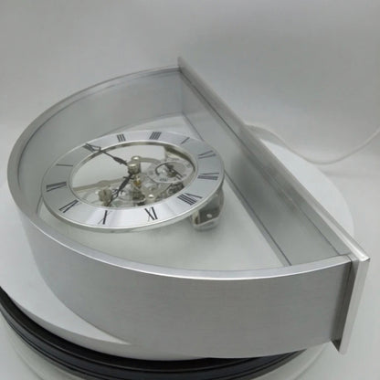 Crystal table clock - Cranley: A half-round aluminum-and-glass mantel clock showcasing a skeleton movement with silver Roman numerals and exposed gears, ideal for special occasions or personalized gifts.