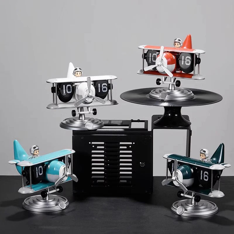 White airplane desk clock in modern minimalist home office