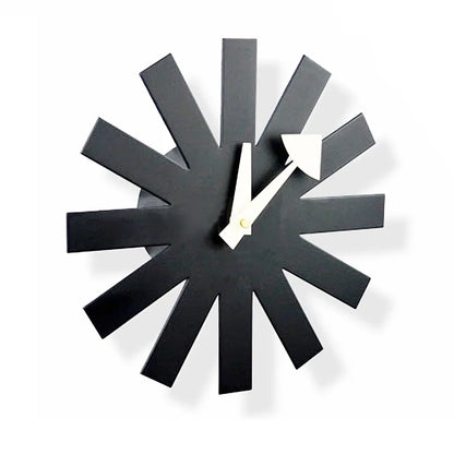 Side angle view of flat-profile black decorative wall clock showing 2.4-inch depth