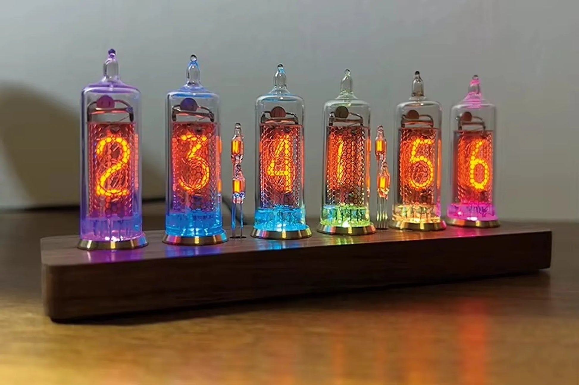 Nixie tube clock - Hartley: A vintage-style display with six glowing Nixie tubes on a wooden base, featuring neon digits and LED backlighting, creating a unique, functional art piece.