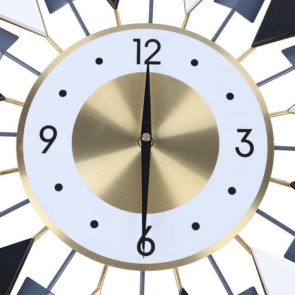 Big Decorative Wall Clocks - Denley: A mid-century style wall clock featuring a design with a brushed-metal gold center, slim black hands, and radiating rods with black and white accents. Silent quartz movement.