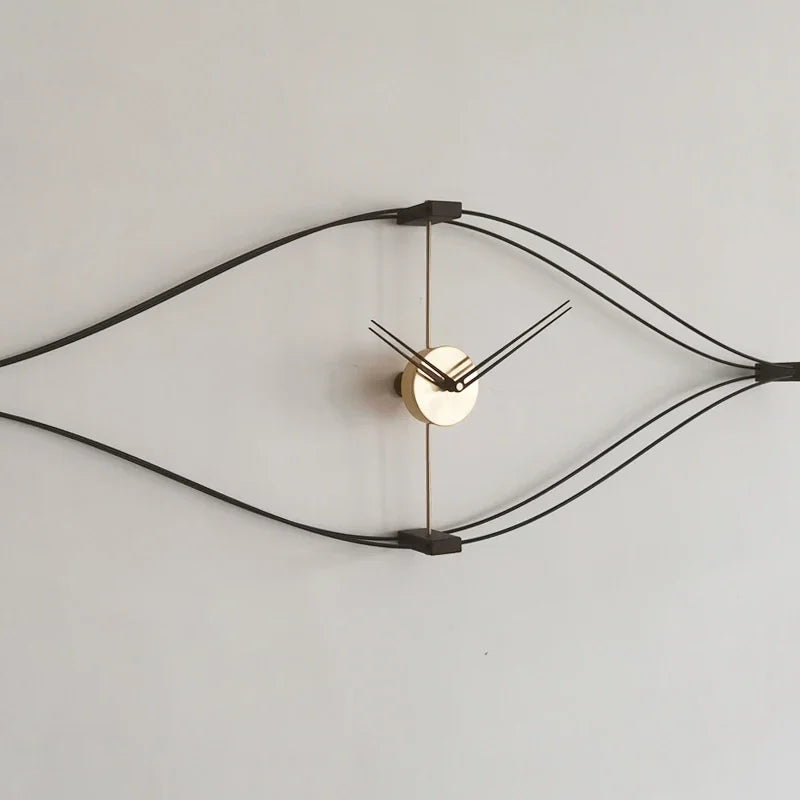 Large decorative wall clock mounted above white living room console table