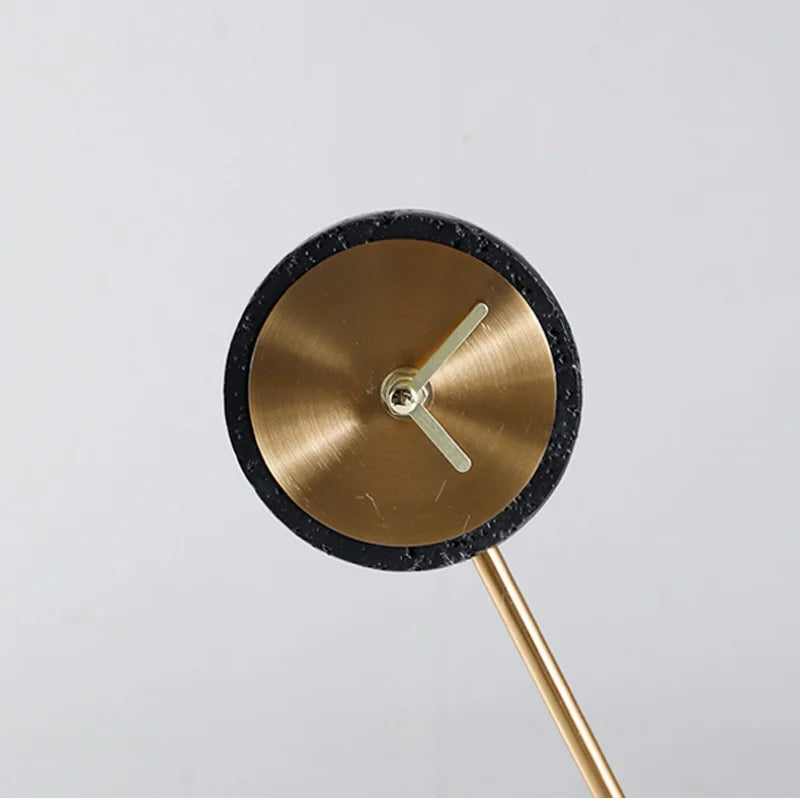 Metal Tabletop Clock - Winsley: A minimalist analog clock with a brushed-brass dial, decorative open-face gears, and a slim metal stand, adding industrial charm to any desk or mantel.