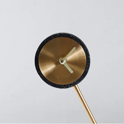 Metal Tabletop Clock - Winsley: A minimalist analog clock with a brushed-brass dial, decorative open-face gears, and a slim metal stand, adding industrial charm to any desk or mantel.