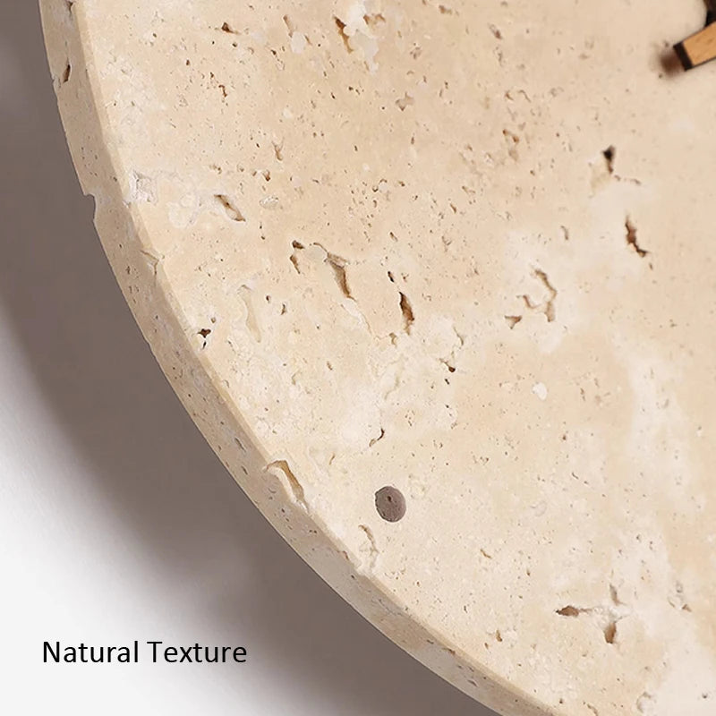 Modern wall clock for living room - Torwyn: Close-up of a 9-inch travertine disc highlighting its natural pores and veins, showcasing the unpolished stone surface with Natural Texture text, emphasizing its unique, minimalist design.