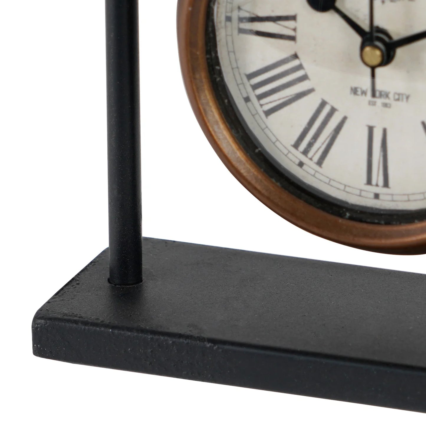 Retro Table Clock - Kelros: A classic mid-century clock with a brass-finished frame, black metal base, and clear Roman numerals, embodying retro elegance for any bedroom or desk.