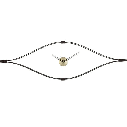 Oversized 20-inch wall clock displayed above modern entryway furniture